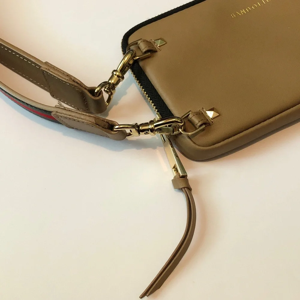 Bandolier tan mini crossbody bag/red & green strap